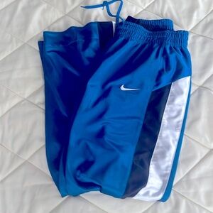 Nike REVERSIBLE Men’s Boy’s elastic waist zip legs swoosh track pants black blue
